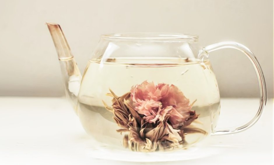 Чайник с цветком внутри